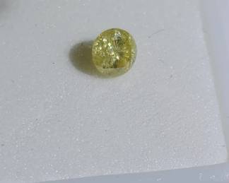 Lot # : 610 - 0.20ct Round natural yellow diamond loose
