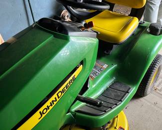 John Deere riding lawn mower