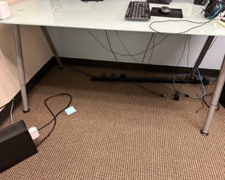 glass top tables/desks

63” l x 31 1/2” d x 30” h