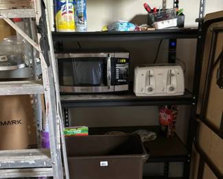 Microwave, toaster, waste baskets