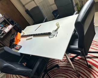 Conference table & chairs - 43” W x 77” L x 30” H
Adjustable legs