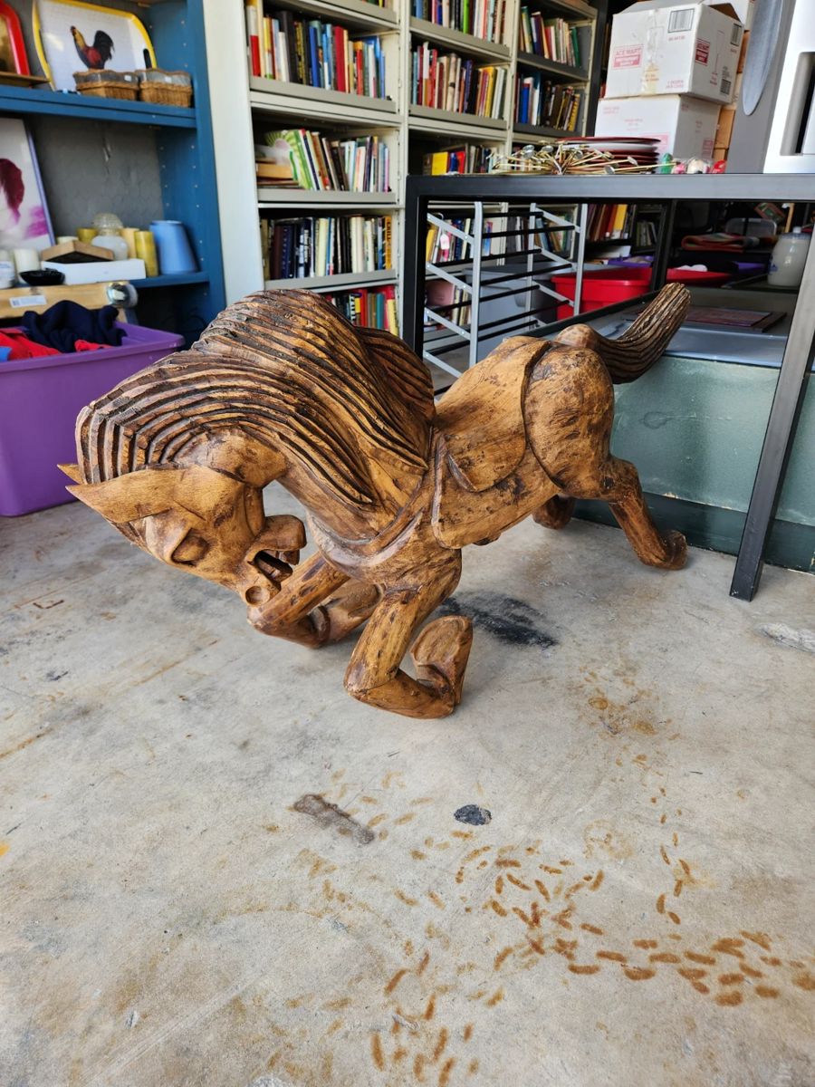 Hand carved horse sculpture
$200