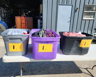 More totes full of clothes.
$1 per piece of clothing.