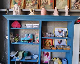 Wall art on top $65 each
Indian sculpture $10-$15 each
Nik naks on blue shelf $2-$15 each. Roller skates are $20