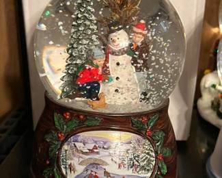 Roman musical snow globe