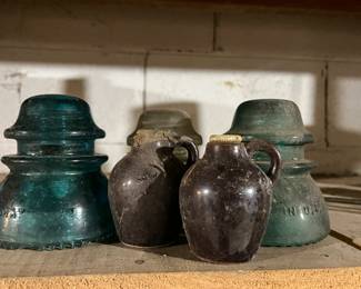 insulators and clay jugs