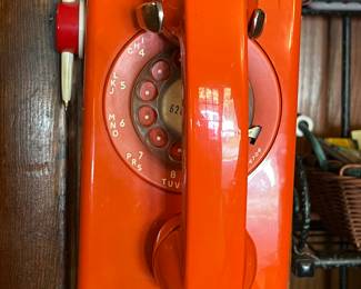Orange rotary dial phone 