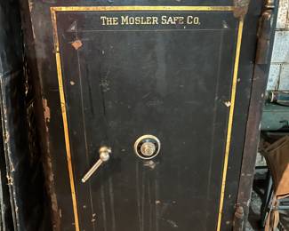 This safe was used in the Payne Ford Motor Company in New Tazewell, TN from the 1960's-1990's. A professional locksmith serviced the safe 7/24.  He estimated the safe to be pre 1920's.  The top is stamped Standard Jellico Coal Company which began operations in the late 1800's.  It has a working combination.  We have a local company available for moving. 