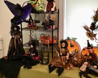 A Delightful collection of Halloween decor. Kitty cats, and Charmingly dressed witches!