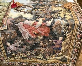 52 x 79. “The Swing”. French woven Jacquard tapestry based on a work by French artist Jean-Honore Fragonard by Gobelin Manufacturer. Paris, France. Includes pole and tassels.
