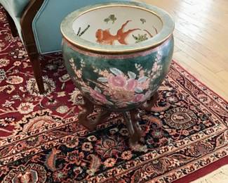 Chinese porcelain fish bowl/planter. Hand painted. Two piece carved stand.