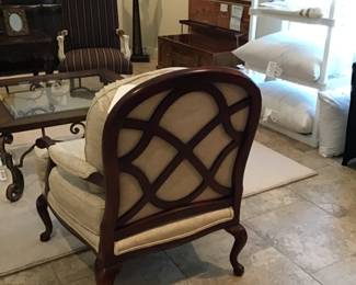 Classic Berger chair, beautifully upholstered in luxury designer fabric. Chippendale style. Mahogany frame with lattice back. 