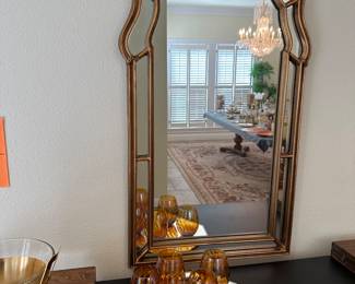 Art deco style mirror. Fancy hand cut and arched mirror, burnished style gold frame. Classic!