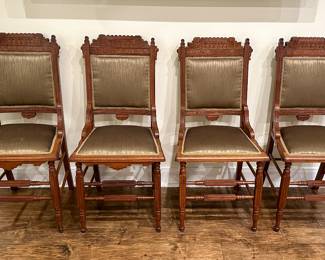 Antique Eastlake chairs upholstered and silk.
