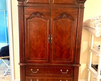 This handsome armoire is perfect for all types of storage needs. Three deep shelves and two pull out cubbies over three generously sized drawers. An elegant alternative to a standard cabinet!