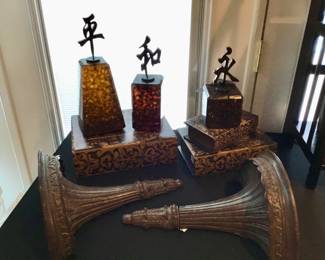 Final “Harmony, Peace, and Eternity icon weights. Set of three tobacco resin, handmade finishing an antique application.

Set of two large fluted wall shelf/sconces. Hollywood Regency style.