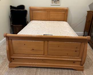 Queen pine sleigh bed in perfect condition! Free mattress and boxsprings with purchase.