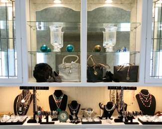 A wide and fabulous assortment of costume jewelry. Bracelets, necklaces, rings, In gold and silver tone, Rhinestone, beaded, hammered, pearl, brass, and in every color of the rainbow. 