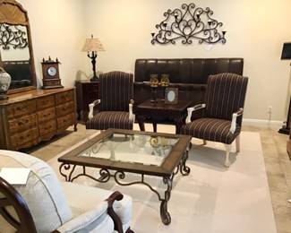 Main bedroom with gorgeous leather, iron, upholstered furniture, all in like new condition.