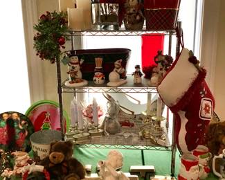 Angels, snowman, candles, and other Christmas decor.