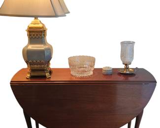 Antique mahogany drop leaf table with cabriole legs