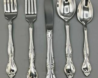 Brand new still in wrappers Oneida Affection Stailess steel flatware svc for 8 plus serving pieces