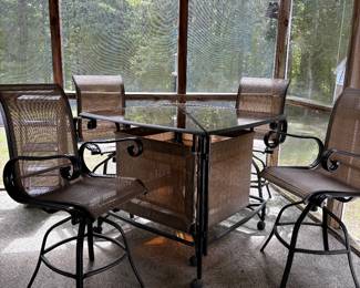 Outdoor dining table - table separates- 4 chairs 