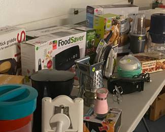 Small kitchen appliances. Many in boxes and never or lightly used.