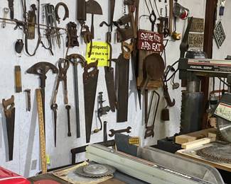 Antique tools, bottles, buckets, license plates, horse shoes.....