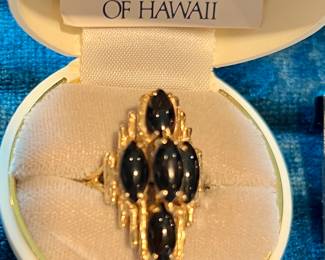 BLACK CORAL AND 14K GOLD RING.