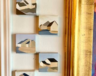 LOVE HOW THESE 9 SMALL OIL PAINTINGS ARE ARRANGED.