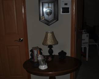 Small round oak table and newer Regulator clock