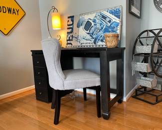 Neutral Gray Accent Chair, Metal Desk Lamp, Mixed Media Wall Art (B), Lidded wicker basket, Desk and filing cabinet, Metal Ferris Wheel Planter