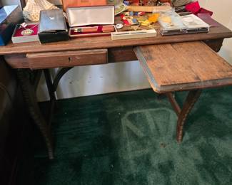 This is a cute Antique Writing Desk with one Drawer and Pull Out Shelf