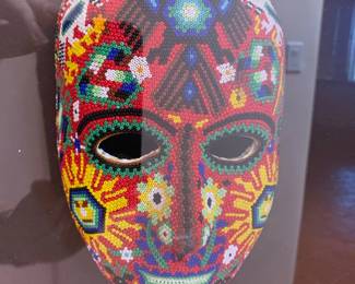 Huichol mask framed in acrylic