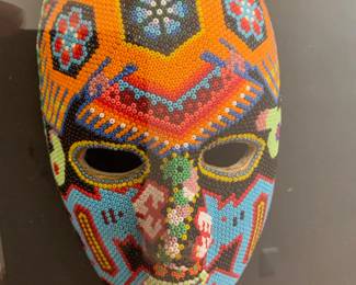 Huichol mask framed in acrylic