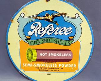 Referee Paper Shot Shells Enameled Metal Sign, 11.75" Diameter