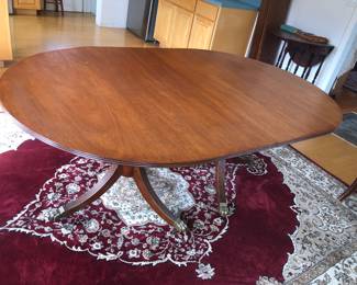 Oval mahogany Duncan Phyfe style dining table (72”L, 46”W, 28.5”H)