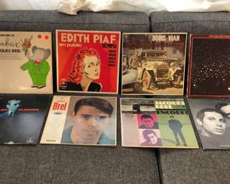 Records including vintage French titles (Edith Piaf, Jacques Brel)
