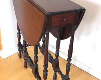 Mahogany gate leg dropleaf table with drawer (as shown: 29”H, 27”L, 10.5”D)