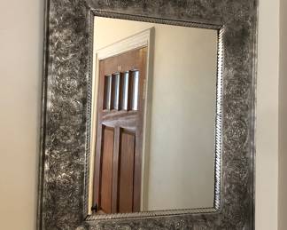 Mirror with hammered tin over wood frame (23” x 28”)