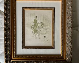 #36 ----	
ARTIST: Henri de Toulouse-Lautrec
TITLE:	L'Anazone et Le Chien
MEDIUM:	Framed Lithograph in pale green ink on Jaron paper after the original
EDITION:	From the edition of 175 examples executed at Imprimerie J. Langlois Paris, July 31, 1926
CANVAS SIZE: 135mm x 260mm
COA: Yes