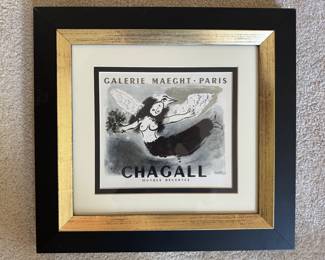 #49 ----	
ARTIST: Marc Chagall
TITLE:	Chagall
MEDIUM:	Framed Original lithograph in colors on thick wove paper
EDITION:	Printed by Mourlot Freres of Paris, 1959. Scarce
CANVAS SIZE: 235mm x 305mm
COA: Yes