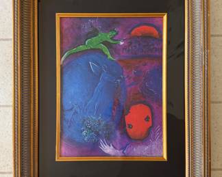 #106 ----	
ARTIST: Marc Chagall
TITLE:	The Dream of Lamon and Dryas
MEDIUM:	Framed lithograph printed in seven colors on wove paper after the original.
EDITION:	Published by George Braziller in New York, 1977.
CANVAS SIZE: 235mm x 320mm
COA: Yes