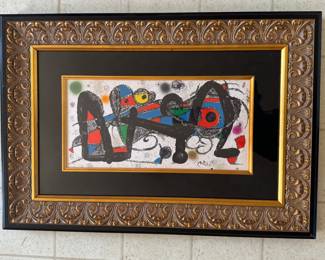 #88 ----	
ARTIST: Joan Miro
TITLE:	Portugal (From the Escultor Suite) Ref; Mourlot 936
MEDIUM:	Framed original lithograph in color on thick Guarro paper. Signed on the stone by the artist. 
EDITION:	First State. Printed by Poligrafa in Spain 1974. Scarce
CANVAS SIZE: 200mm x 400mm
COA: Yes