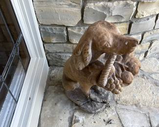 Concrete dog - base is broken