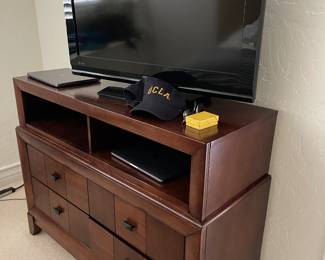 Dresser and several tvs