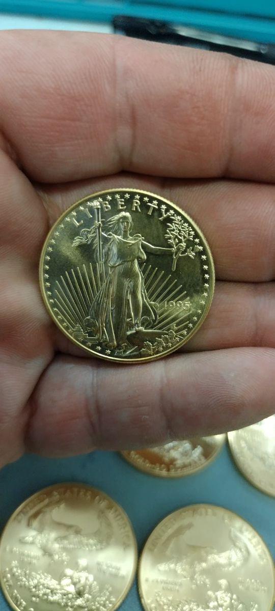 1oz American Gold Eagle .999 Fine Gold. 8 available
