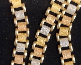 Monster 14k necklace with white,yellow, and rose gold links 