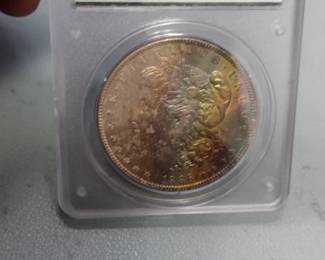 Vintage PCGS rated. 1886 Morgan Silver dollar ms64! rainbow toned